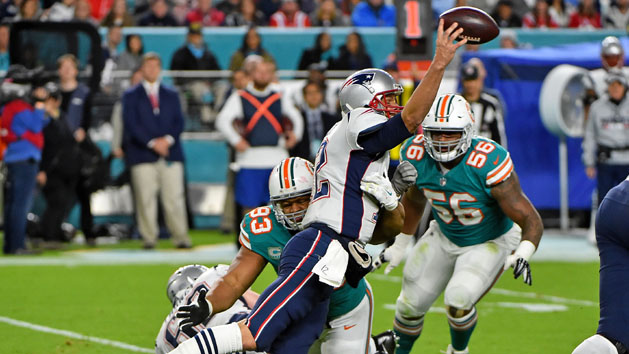 Dec 11, 2017; Miami Gardens, FL, USA; Miami Dolphins defensive tackle Ndamukong Suh (93) pressures New England Patriots quarterback Tom Brady (12) during the second half at Hard Rock Stadium. Photo Credit: Jasen Vinlove-USA TODAY Sports