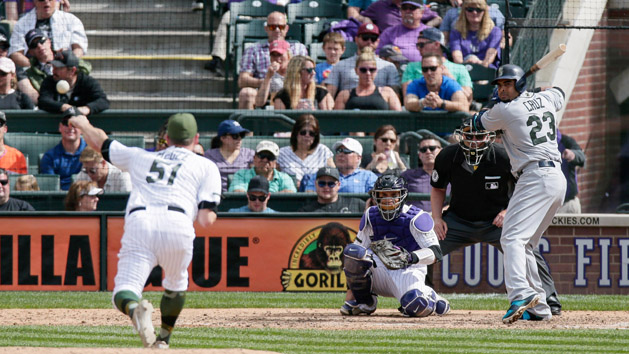 May 29, 2017; Denver, CO, USA; Colorado Rockies relief pitcher Jake McGee (51) delivers a pitch to Seattle Mariners right fielder Nelson Cruz (23) in the ninth inning at Coors Field. Photo Credit: Isaiah J. Downing-USA TODAY Sports