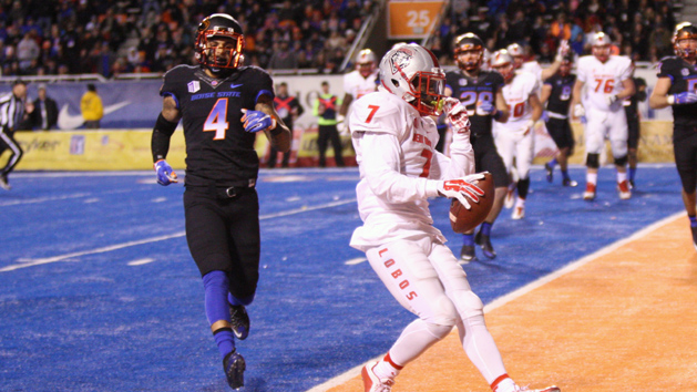 Nov 14, 2015; Boise, ID, USA; New Mexico Lobos running back Teriyon Gipson (7) scores during second half action against the Boise State Broncos at Albertsons Stadium. New Mexico beat Boise State 31-24. Mandatory Credit: Brian Losness-USA TODAY Sports