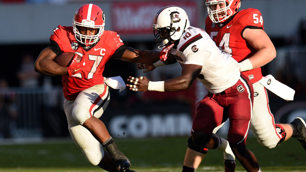 Sep 19, 2015; Athens, GA, USA; Georgia Bulldogs running back Nick Chubb (27) runs against South Carolina Gamecocks linebacker Skai Moore (10) during the first half at Sanford Stadium. Mandatory Credit: Dale Zanine-USA TODAY Sports