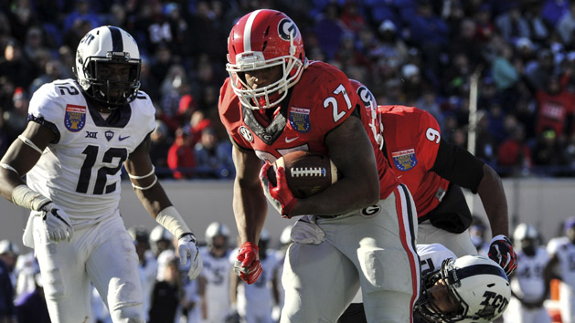 Dec 30, 2016; Memphis, TN, USA; Georgia Bulldogs running back Nick Chubb (27) carries the ball during the second half against TCU Horned Frogs cornerback Jeff Gladney (12) at Liberty Bowl. Georgia Bulldogs defeated the TCU Horned Frogs 31-23. Photo Credit: Justin Ford-USA TODAY Sports