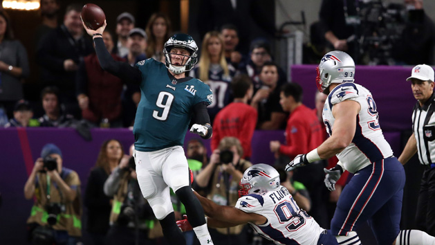 Feb 4, 2018; Minneapolis, MN, USA; Philadelphia Eagles quarterback Nick Foles (9) throws against New England Patriots defensive end Trey Flowers (98) during the second quarter in Super Bowl LII at U.S. Bank Stadium. Photo Credit: Winslow Townson-USA TODAY Sports