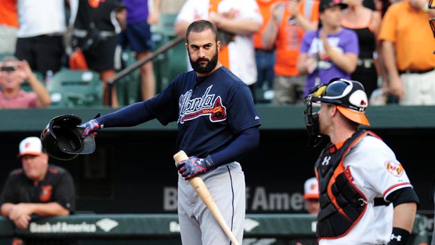 Jul 27, 2015; Baltimore, MD, USA; Atlanta Braves outfielder Nick Markakis (22) tips his helmet to the fans in the first inning against the Baltimore Orioles at Oriole Park at Camden Yards. Photo Credit: Evan Habeeb-USA TODAY Sports