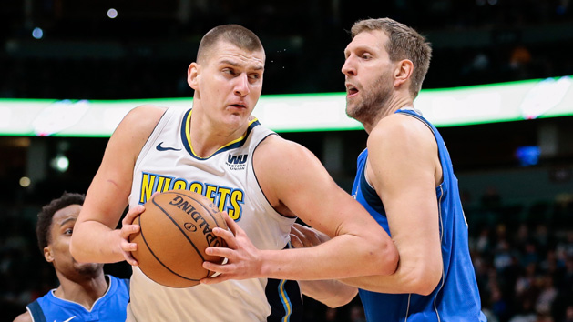 Jan 16, 2018; Denver, CO, USA; Dallas Mavericks forward Dirk Nowitzki (41) guards Denver Nuggets center Nikola Jokic (15) in the second quarter at the Pepsi Center. Photo Credit: Isaiah J. Downing-USA TODAY Sports