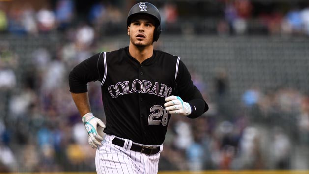 Aug 3, 2016; Denver, CO, USA; Colorado Rockies third baseman Nolan Arenado (28) heads home after hitting a three run home run in the first inning against the Los Angeles Dodgers at Coors Field. Photo Credit: Ron Chenoy-USA TODAY Sports
