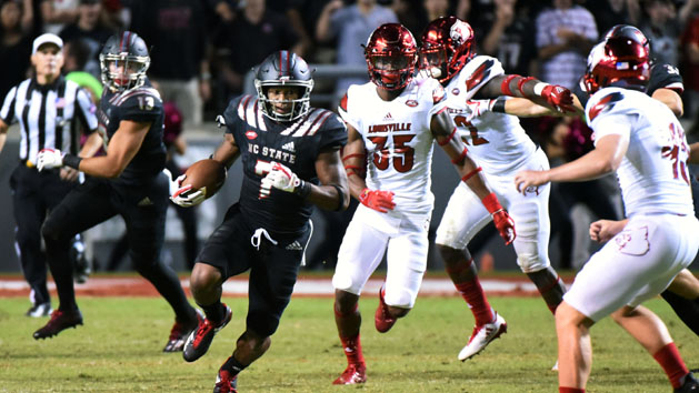 Oct 5, 2017; Raleigh, NC, USA; North Carolina State Wolfpack running back Nyheim Hines (7) returns a kickoff during the second half against the Louisville Cardinals at Carter-Finley Stadium. The Wolfpack won 39-25. Photo Credit: Rob Kinnan-USA TODAY Sports