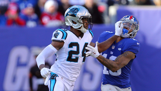 Dec 20, 2015; East Rutherford, NJ, USA; New York Giants wide receiver Odell Beckham Jr. (13) is defended by Carolina Panthers cornerback Josh Norman (24) during the first quarter at MetLife Stadium. Mandatory Credit: Brad Penner-USA TODAY Sports