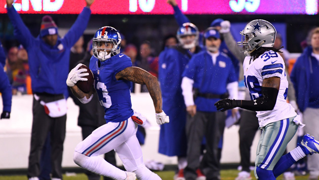 Dec 11, 2016; East Rutherford, NJ, USA; New York Giants wide receiver Odell Beckham (13) scores the game winning TD in the second half against the Dallas Cowboys at MetLife Stadium. Photo Credit: Robert Deutsch-USA TODAY Sports
