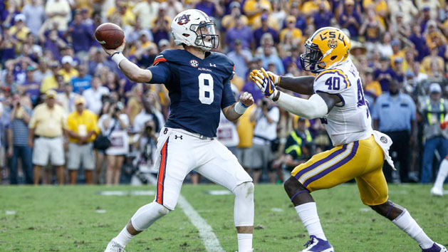 Auburn Tigers quarterback Jarrett Stidham (8) is hit by LSU Tigers linebacker Devin White (40) as he throws during the second half of a game at Tiger Stadium. LSU defeated Auburn 27-23 last season in Baton Rouge.. Photo Credit: Derick E. Hingle-USA TODAY Sports