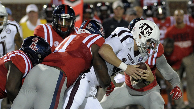 Oct 24, 2015; Oxford, MS, USA; Mississippi Rebels defensive end Channing Ward (11) tackles Texas A&M Aggies quarterback Kyle Allen (10) during the game at Vaught-Hemingway Stadium. Mandatory Credit: Justin Ford-USA TODAY Sports