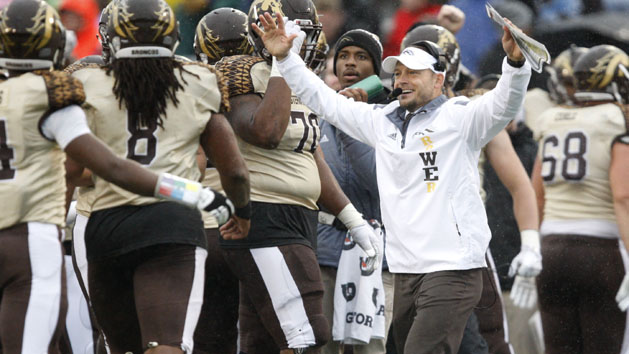 Nov 27, 2015; Toledo, OH, USA; Western Michigan Broncos head coach P.J. Fleck celebrates with his team during the third quarter against the Toledo Rockets at Glass Bowl. Broncos win 35-30. Photo Credit: Raj Mehta-USA TODAY Sports