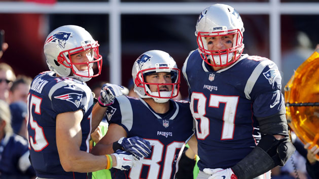 Oct 1, 2017; Foxborough, MA, USA; New England Patriots wide receiver Chris Hogan (15) and tight end Rob Gronkowski (87) celebrate with receiver Danny Amendola (80) after a touchdown during the second half against the Carolina Panthers at Gillette Stadium. Photo Credit: Greg M. Cooper-USA TODAY Sports