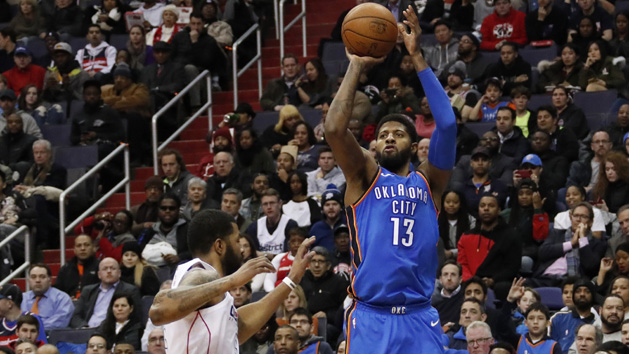 Jan 30, 2018; Washington, DC, USA; Oklahoma City Thunder forward Paul George (13) shoots the ball over Washington Wizards forward Markieff Morris (5) in the second quarter at Capital One Arena. Photo Credit: Geoff Burke-USA TODAY Sports