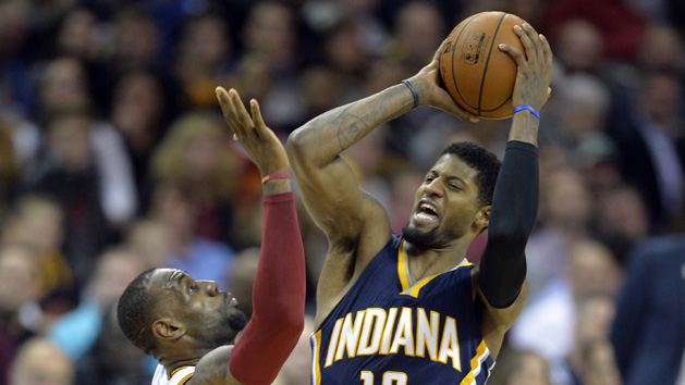Feb 29, 2016; Cleveland, OH, USA; Indiana Pacers forward Paul George (13) shoots against Cleveland Cavaliers forward LeBron James (23) in the second quarter at Quicken Loans Arena. Photo Credit: David Richard-USA TODAY Sports