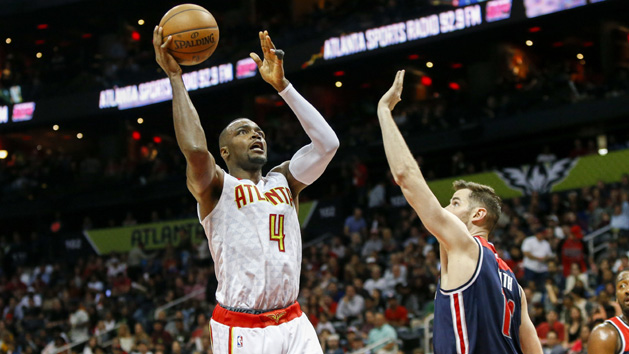 Apr 24, 2017; Atlanta, GA, USA; Atlanta Hawks forward Paul Millsap (4) shoots the ball against the Washington Wizards in the third quarter in game four of the first round of the 2017 NBA Playoffs at Philips Arena. Photo Credit: Brett Davis-USA TODAY Sports
