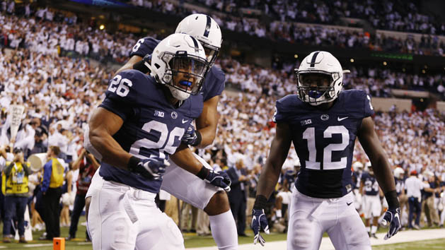Dec 3, 2016; Indianapolis, IN, USA; Penn State Nittany Lions running back Saquon Barkley (26) celebrates with teammates after catching a touchdown pass against the Wisconsin Badgers in the second half during the Big Ten Championship college football game at Lucas Oil Stadium. Photo Credit: Brian Spurlock-USA TODAY Sports