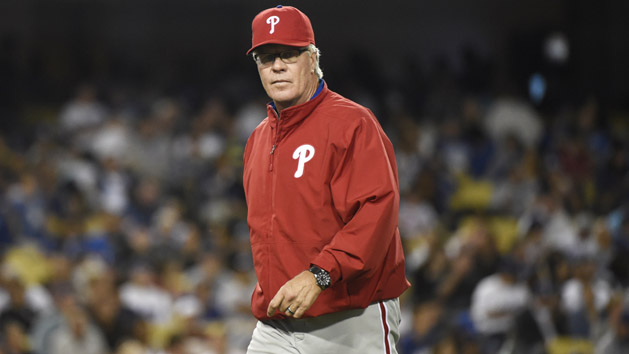 Jul 9, 2015; Los Angeles, CA, USA; Philadelphia Phillies interim manager Pete Mackanin (45) walks back to the dugout after replacing Philadelphia Phillies starting pitcher Severino Gonzalez (52) against the Los Angeles Dodgers in the sixth inning at Dodger Stadium. (Richard Mackson-USA TODAY Sports)