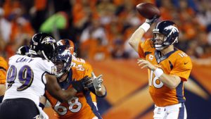 Manning’s 7-TD night overwhelms Ravens