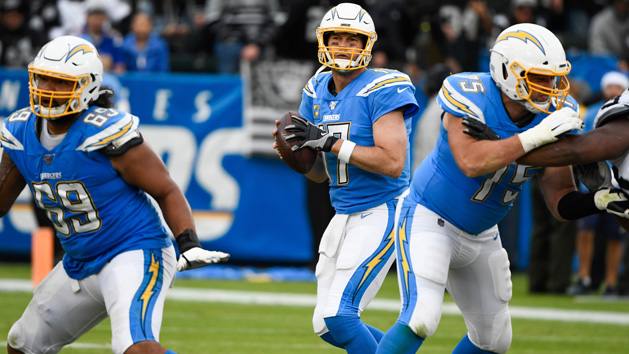 Jun 13, 2017; San Diego, CA, USA; Los Angeles Chargers quarterback Philip Rivers (17) passes during a drill in mini camp at Charger Park. Photo Credit: Jake Roth-USA TODAY Sports