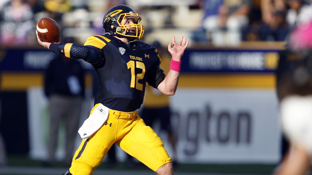 Oct 10, 2015; Toledo, OH, USA; Toledo Rockets quarterback Phillip Ely (12) throws the ball during the third quarter against the Kent State Golden Flashes at Glass Bowl. Rockets win 38-7. Mandatory Credit: Raj Mehta-USA TODAY Sports