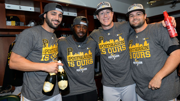 Sep 23, 2015; Denver, CO, USA; Pittsburgh Pirates celebrate the win over the Colorado Rockies at Coors Field. The Pirates defeated the Rockies 13-7. Mandatory Credit: Ron Chenoy-USA TODAY Sports
