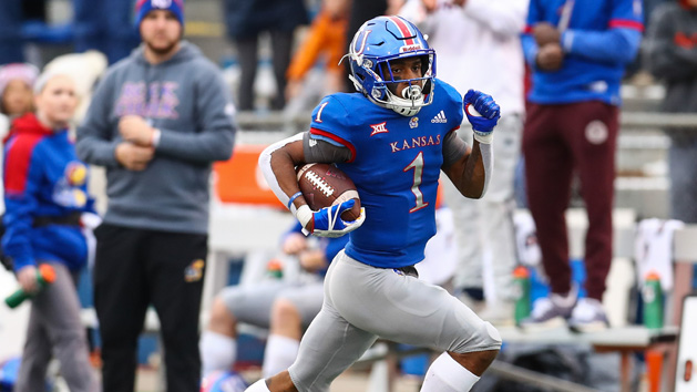 Nov 23, 2018; Lawrence, KS, USA; Kansas Jayhawks running back Pooka Williams Jr. (1) runs for a touchdown against the Texas Longhorns in the second half at Memorial Stadium. Photo Credit: Jay Biggerstaff-USA TODAY Sports