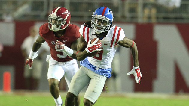 Sep 19, 2015; Tuscaloosa, AL, USA; Mississippi Rebels wide receiver Quincy Adeboyejo (8) runs for a touchdown at Bryant-Denny Stadium. The Rebels defeated the Tide 43-37. Mandatory Credit: Marvin Gentry-USA TODAY Sports