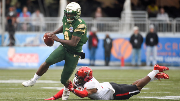 Dec 23, 2017; Birmingham, AL, USA; South Florida Bulls quarterback Quinton Flowers (9) carries the ball Texas Tech Red Raiders defensive back Vaughnte Dorsey (15) during the 4th quarter in the 2017 Birmingham Bowl at Legion Field. Photo Credit: Adam Hagy-USA TODAY Sports