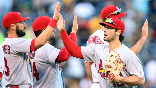 Jun 12, 2016; Pittsburgh, PA, USA; St. Louis Cardinals center fielder Randal Grichuk (15) high-fives teammates after the Cardinals defeated the Pittsburgh Pirates at PNC Park. St. Louis won 8-3. Photo Credit: Charles LeClaire-USA TODAY Sports
