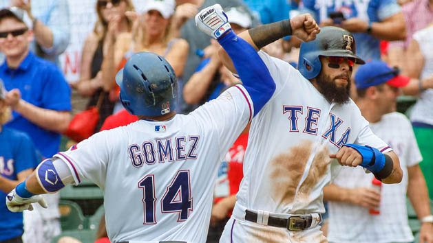 Jun 22, 2017; Arlington, TX, USA; Texas Rangers center fielder Carlos Gomez (14) is greeted by second baseman Rougned Odor (12) after hitting a three run home run Toronto Blue Jays in the bottom the third inning at Globe Life Park in Arlington. Photo Credit: Ray Carlin-USA TODAY Sports