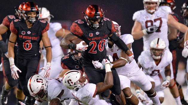 Sep 16, 2017; San Diego, CA, USA; San Diego State Aztecs running back Rashaad Penny (20)a runs the ball as Stanford Cardinal safety Frank Buncom (5) defends during the first quarter at Qualcomm Stadium. Photo Credit: Jake Roth-USA TODAY Sports