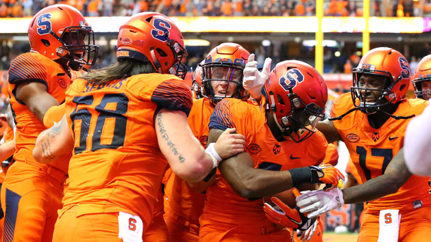 Oct 20, 2018; Syracuse, NY, USA; Syracuse Orange tight end Ravian Pierce (center) celebrates his game winning touchdown catch with teammates in overtime against the North Carolina Tar Heels at the Carrier Dome. Photo Credit: Rich Barnes-USA TODAY Sports