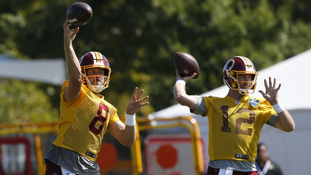Jul 25, 2019; Richmond, VA, USA; Washington Redskins quarterback Case Keenum (8) and Redskins quarterback Colt McCoy (12) pass the ball during drills as part of day one of Redskins training camp at Bon Secours Washington Redskins Training Center. Photo Credit: Geoff Burke-USA TODAY Sports