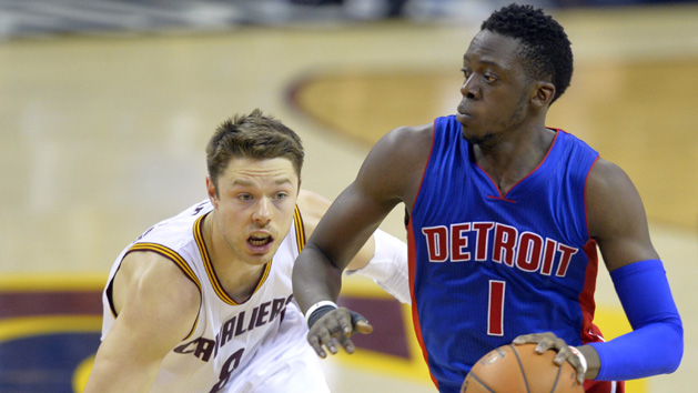 Feb 22, 2016; Cleveland, OH, USA; Detroit Pistons guard Reggie Jackson (1) dribbles against Cleveland Cavaliers guard Matthew Dellavedova (8) in the fourth quarter at Quicken Loans Arena. Mandatory Credit: David Richard-USA TODAY Sports