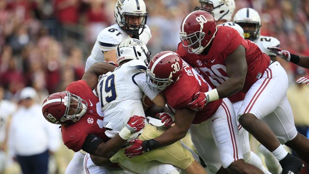 Nov 21, 2015; Tuscaloosa, AL, USA; Alabama Crimson Tide linebacker Reggie Ragland (19) along with linebacker Denzel Devall (30) and defensive lineman Jarran Reed (90) tackle Charleston Southern Buccaneers quarterback Kyle Copeland (19) at Bryant-Denny Stadium. Mandatory Credit: Marvin Gentry-USA TODAY Sports