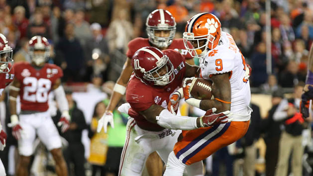 Former Alabama Crimson Tide linebacker Reuben Foster (10) tackles Clemson Tigers running back Wayne Gallman (9 in the 2017 College Football Playoff National Championship Game at Raymond James Stadium. Photo Credit: Matthew Emmons-USA TODAY Sports