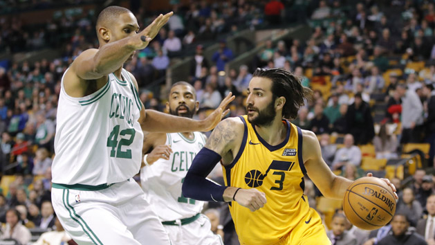 Dec 15, 2017; Boston, MA, USA; Utah Jazz guard Ricky Rubio (3) drives the ball against Boston Celtics forward Al Horford (42) and guard Kyrie Irving (11) in the second half at TD Garden. The Jazz defeated the Boston Celtics 107-95. Photo Credit: David Butler II-USA TODAY Sports