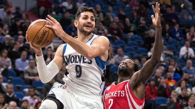 Jan 11, 2017; Minneapolis, MN, USA; Minnesota Timberwolves guard Ricky Rubio (9) passes around Houston Rockets guard Patrick Beverley (2) during the third quarter at Target Center. The Timberwolves defeated the Rockets 119-105. Photo Credit: Brace Hemmelgarn-USA TODAY Sports
