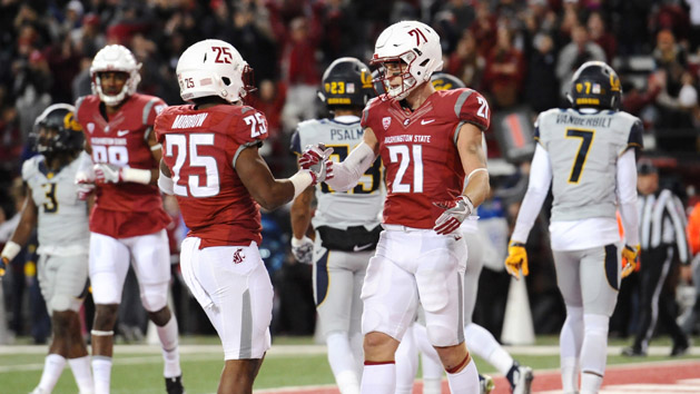 Nov 12, 2016; Pullman, WA, USA; Washington State Cougars wide receiver River Cracraft (21) and Washington State Cougars running back Jamal Morrow (25) celebrate a touchdown against the California Golden Bears during the first half at Martin Stadium. Photo Credit: James Snook-USA TODAY Sports