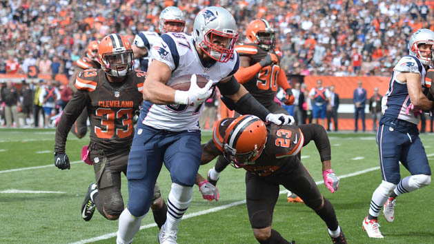 Oct 9, 2016; Cleveland, OH, USA; New England Patriots tight end Rob Gronkowski (87) breaks the tackle of Cleveland Browns cornerback Joe Haden (23) during the first quarter at FirstEnergy Stadium. Photo Credit: Ken Blaze-USA TODAY Sports