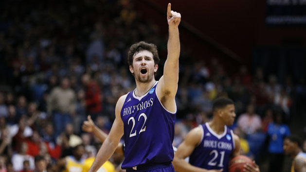 Mar 16, 2016; Dayton, OH, USA; Holy Cross Crusaders guard Robert Champion (22) reacts after the win over Southern University Jaguars in the First Four of the NCAA men's college basketball tournament at Dayton Arena. Holy Cross won 59-55. Mandatory Credit: Rick Osentoski-USA TODAY Sports