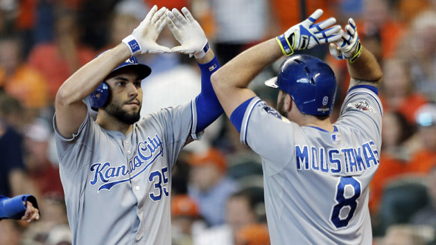 Oct 12, 2015; Houston, TX, USA; Kansas City Royals first baseman Eric Hosmer (35) celebrates with third baseman Mike Moustakas (8) after hitting a two-run home run against the Houston Astros during the ninth inning in game four of the ALDS at Minute Maid Park. Royals won 9-6. Mandatory Credit: Thomas B. Shea-USA TODAY Sports