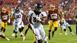 Broncos name rookie RB Freeman as starter
