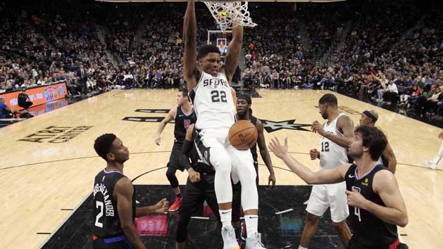 Dec 13, 2018; San Antonio, TX, USA; San Antonio Spurs small forward Rudy Gay (22) dunks the ball past LA Clippers point guard Shai Gilgeous-Alexander (2) during the first half at AT&T Center. Photo Credit: Soobum Im-USA TODAY Sports