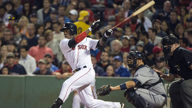 Sep 23, 2015; Boston, MA, USA; Boston Red Sox outfielder Rusney Castillo (38) gets a base hit during the fourth inning of the game against the Tampa Bay Rays at Fenway Park. Mandatory Credit: Gregory J. Fisher-USA TODAY Sports