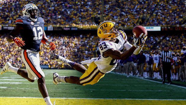 Oct 14, 2017; Baton Rouge, LA, USA; LSU Tigers wide receiver Russell Gage (83) dives for a touchdown catch past Auburn Tigers defensive back Jamel Dean (12) during the second quarter of a game at Tiger Stadium. Photo Credit: Derick E. Hingle-USA TODAY Sports