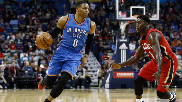 Dec 21, 2016; New Orleans, LA, USA; Oklahoma City Thunder guard Russell Westbrook (0) is defended by New Orleans Pelicans guard Jrue Holiday (11) during the first quarter of a game at the Smoothie King Center. Photo Credit: Derick E. Hingle-USA TODAY Sports