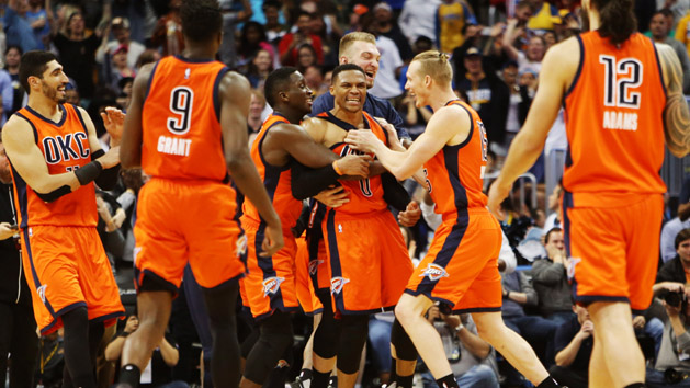 Apr 9, 2017; Denver, CO, USA; Oklahoma City Thunder guard Russell Westbrook (0) celebrates with teammates after hitting a three point basket to win the game as time expired against the Denver Nuggets Pepsi Center. The Thunder won 106-105. Photo Credit: Chris Humphreys-USA TODAY Sports