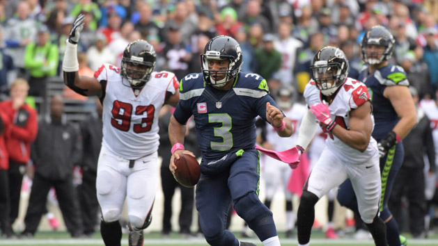 Oct 16, 2016; Seattle, WA, USA; Seattle Seahawks quarterback Russell Wilson (3) carries the ball against the Atlanta Falcons during a NFL football game at CenturyLink Field. The Seahawks defeated the Falcons 26-24. Mandatory Credit: Kirby Lee-USA TODAY Sports
