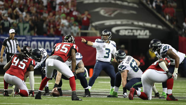 Jan 14, 2017; Atlanta, GA, USA; Seattle Seahawks quarterback Russell Wilson (3) at the line of scrimmage against the Atlanta Falcons during the first quarter in the NFC Divisional playoff at Georgia Dome. Photo Credit: Jason Getz-USA TODAY Sports
